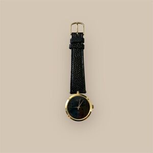 Beautiful vintage Gold and Black Gucci Watch